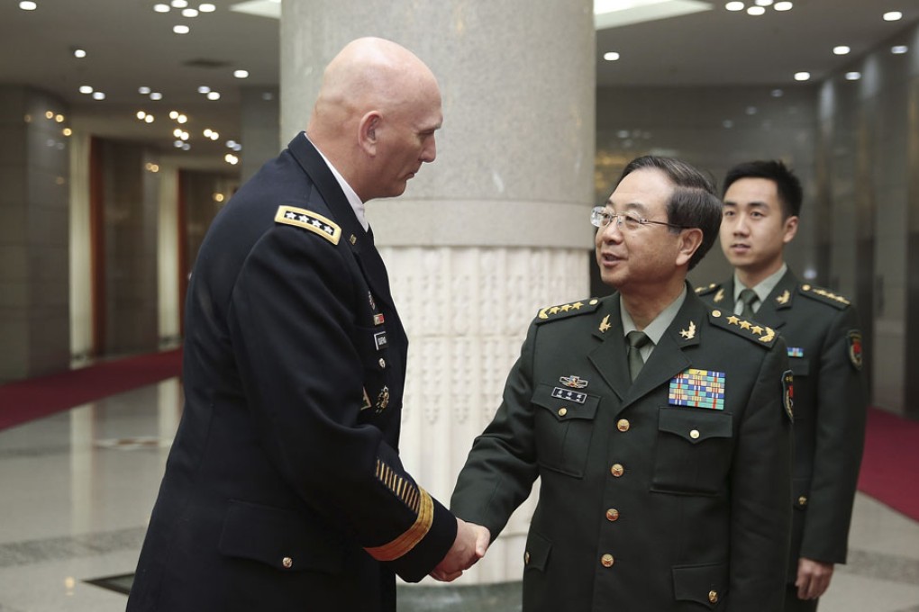 US Army Chief of Staff General Raymond Odierno (left) meets with Fang Huifeng, Chief of the General Staff of the People's Liberation Army. Photo: AP