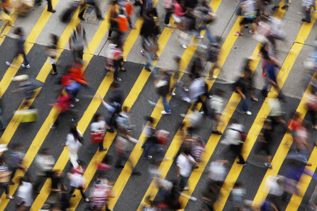 Are cities warping our minds? It may feel that way in Mong Kok (pictured), and scientists have evidence to support the theory. Photo: Reuters