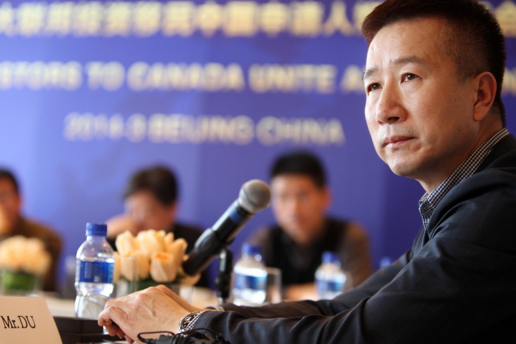 Du Jun, whose visa application has been halted, speaks to the media in Beijing. Photo: Simon Song