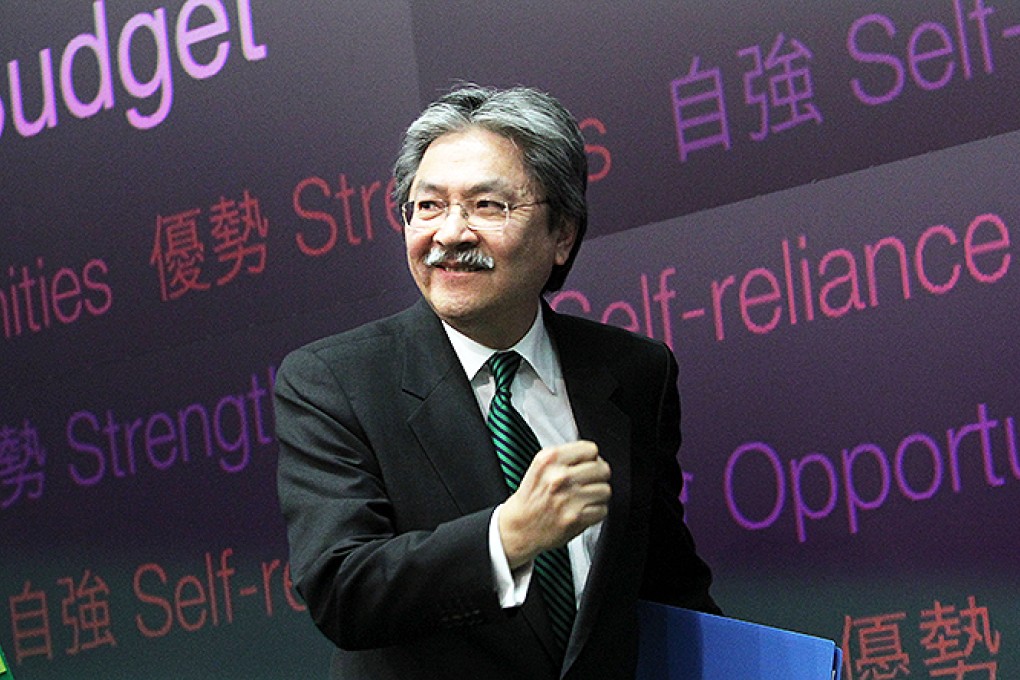 Financial Secretary John Tsang Chun-wah speaks to the media after delivering his budget speech. Photo: Sam Tsang