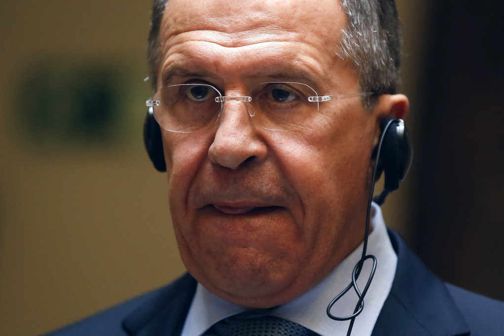 Russian Foreign Minister Lavrov reacts during a joint news conference with Spanish counterpart Garcia-Margallo at the foreign ministry in Madrid. Photo: Reuters