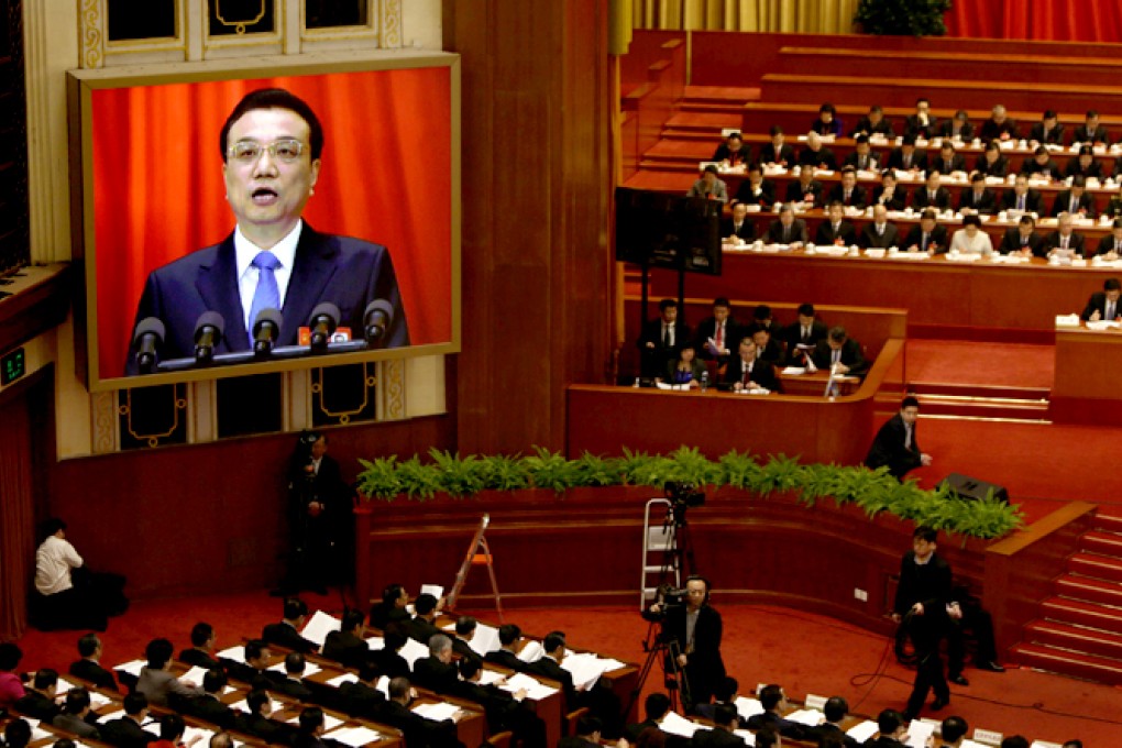 Premier Li Keqiang delivers his report during the opening ceremony of the National People's Congress this morning. Photo: Reuters