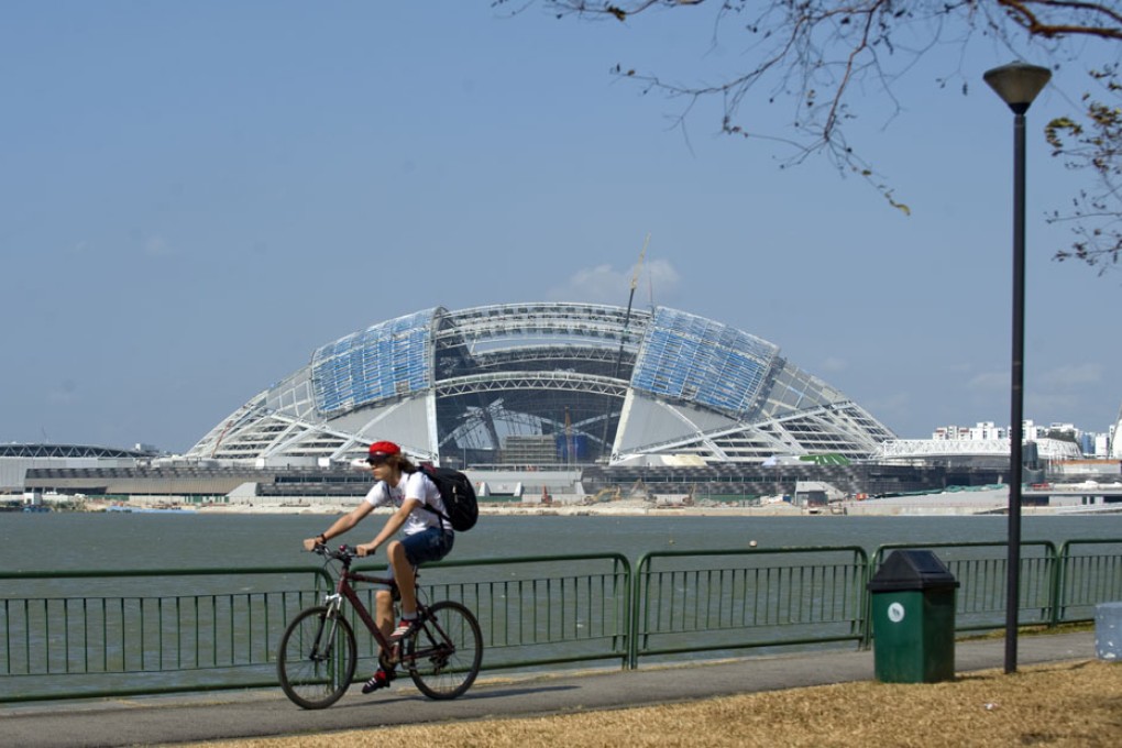 The Singapore Sports Hub is expected to be fully open by June 2014. Photo: Xinhua