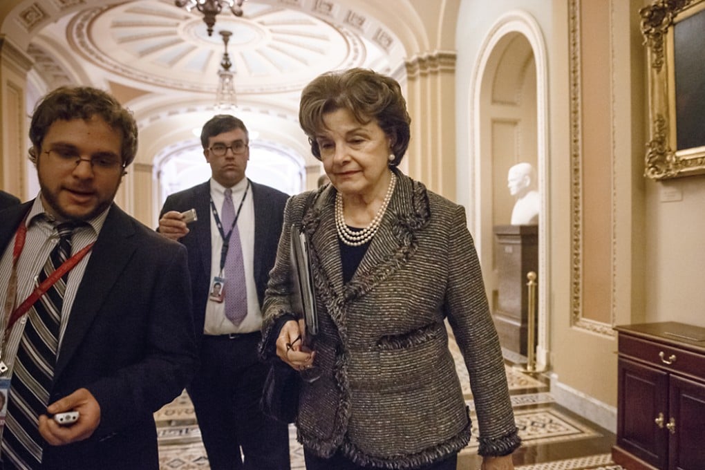 Dianne Feinstein (right), chair of the Senate Intelligence Committee, leaves the chamber at the Capitol in Washington. Photo: AP