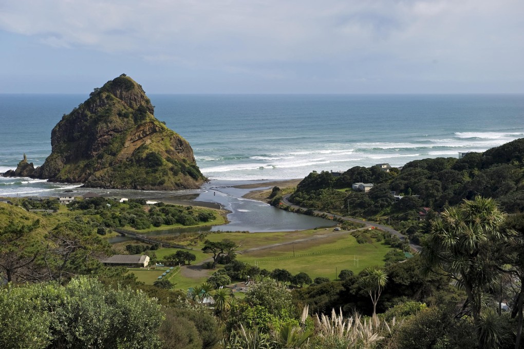 Piha beach. Photos: AFP; Ed Peters