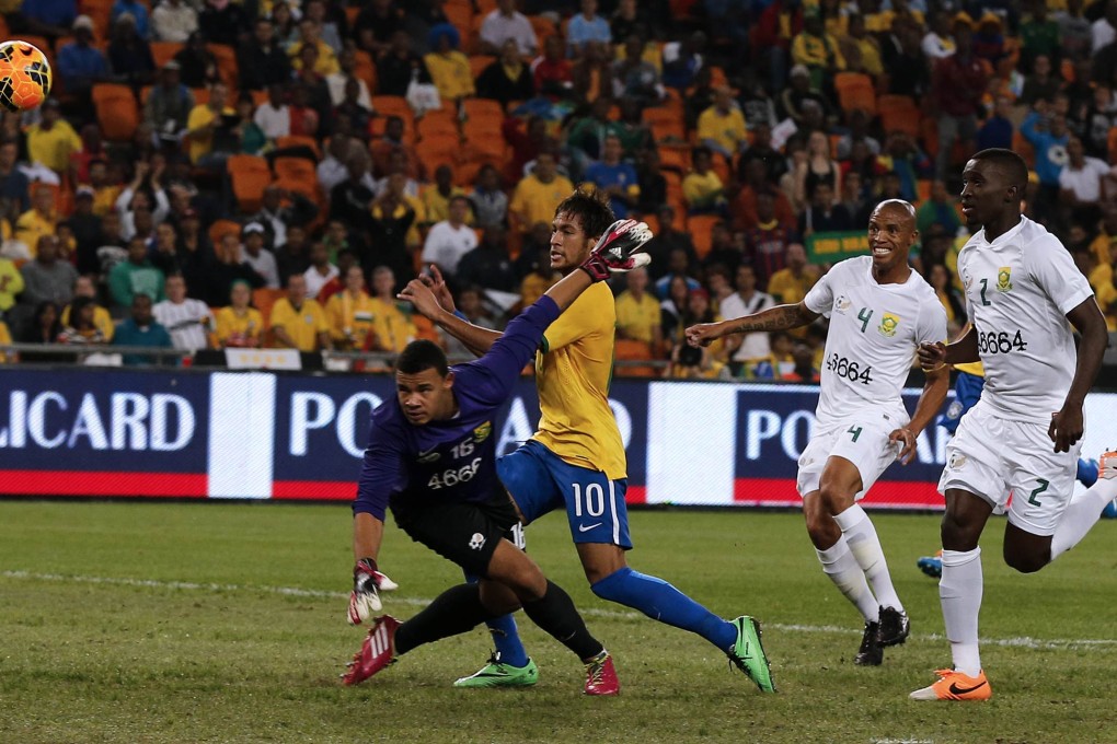 Neymar gets an effort in against South Africa. Photo: Reuters