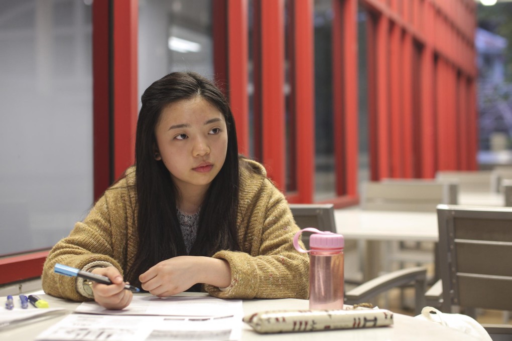 Winnie Lee, 18, studies for her HKDSE exams. Students say that study periods away from school bring them extra stress because they miss the support of classmates and teachers. Photo: Paul Yeung