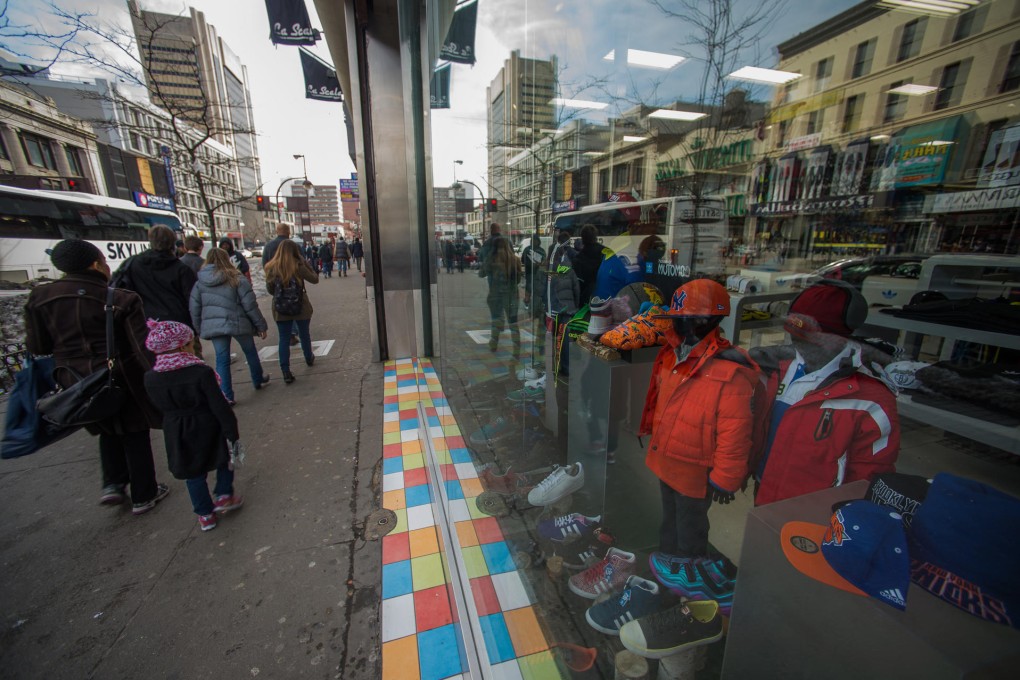 Storefront in Harlem, New York. Super rich Asians are buying up retail properties in the US and Europe. Photo: Bloomberg