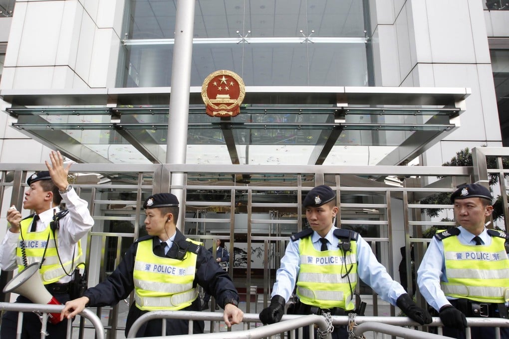 Chan Yau-hei posted online messages calling on people to bomb the central government's liaison office, above. Photo: Reuters