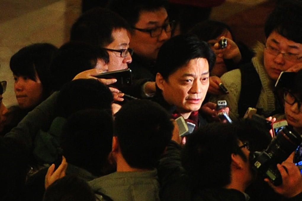 CPPCC delegate Cui Yongyuan (centre) says China lacks a culture of charity, which could impede the proposed charity law more than legislative delays. Photo: Xinhua