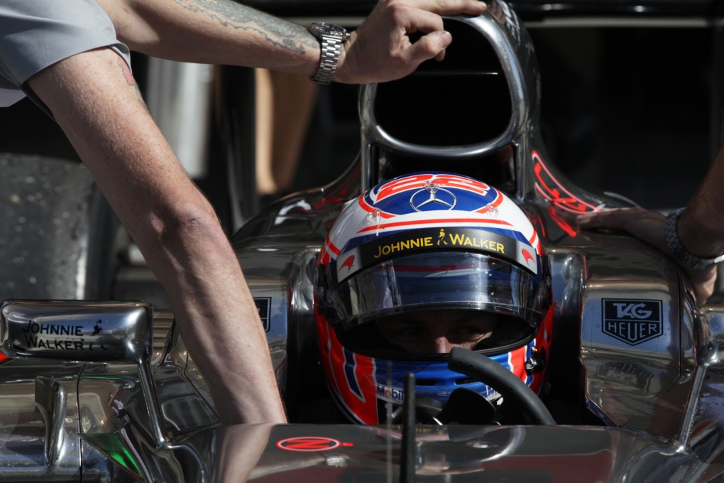 Jenson Button makes a pit stop during testing in Bahrain last month. Photo: AP