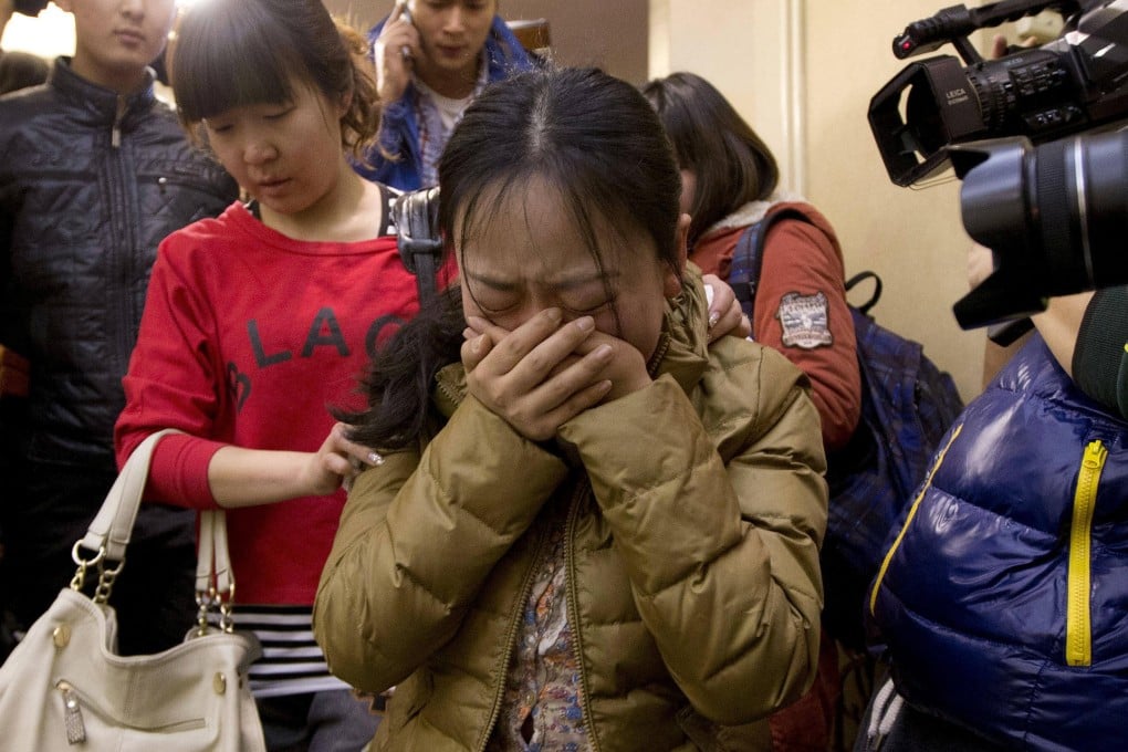 Tears flowed as relatives of passengers were told that they should expect the worst after 30 hours. Photos: SCMP, AP
