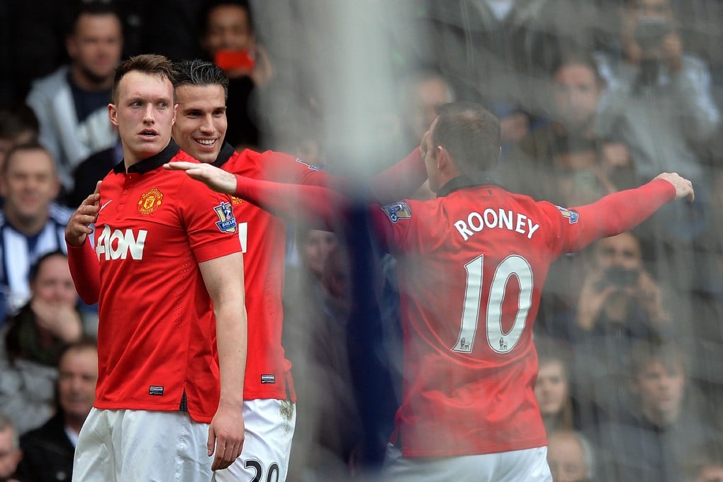 Defender Phil Jones (left) celebrates after scoring United's first goal during their English Premier League match against West Brom at The Hawthorns. Photo: AFP