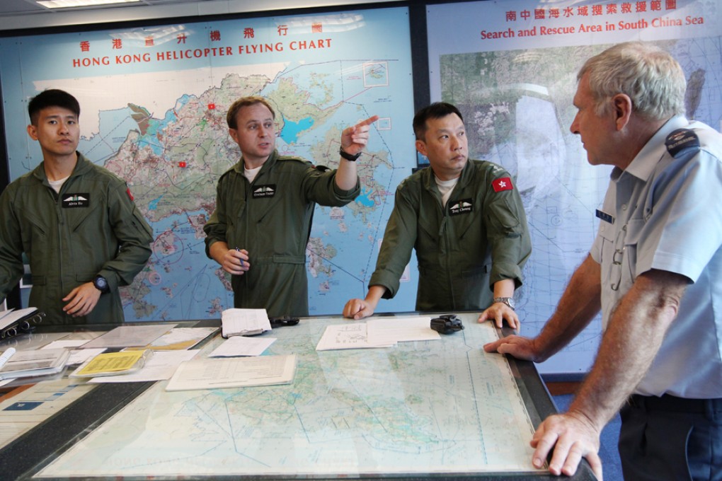 Dai Evans (right), flight operations manager for the Hong Kong Government Flying Service