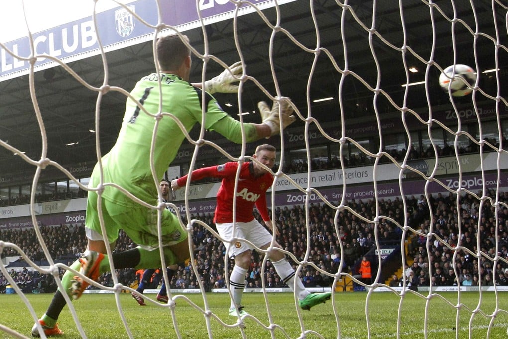 Wayne Rooney scores for Manchester United at The Hawthorns. Photo: Reuters