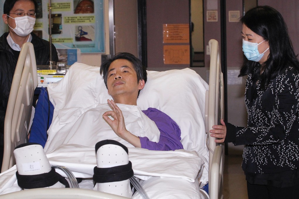 Former Ming Pao chief editor Kevin Lau Chun-to (centre) and his wife Vivian Chan Pik-kwan (right) meet the media last week. Photo: SCMP Pictures