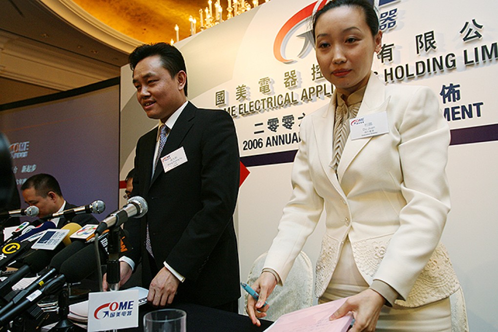 Former Gome Chairman Wong Kwong-yu (left) with former Executive Director Du Juan. Photo: May Tse