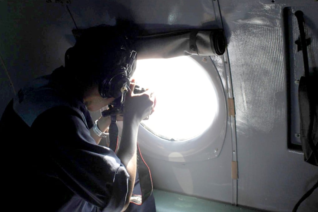 One expert said the search was like looking for "a needle in the sea". Above, the Vietnamese Air Force joins the effort. Photo: Reuters