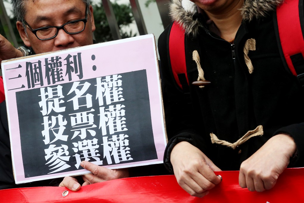 Protester march to Central Government's Liaison office and shout to demand universal suffrage for the chief executive election in 2017. Photo: David Wong