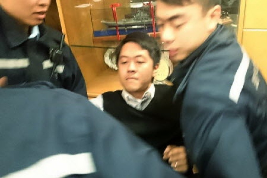 Ted Hui was removed from the meeting. Photo: SMP Pictures