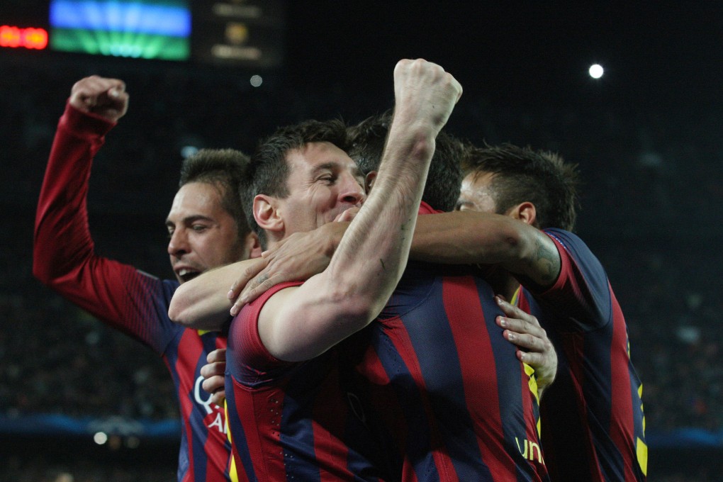 Barcelona's Argentinian forward Lionel Messi (second from left) celebrates with his teammates after scoring against Manchester City. Photo: AFP