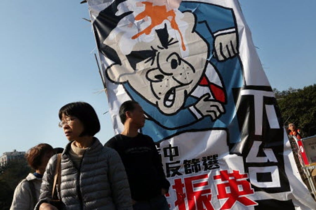 Thousands of citizens join the protest in Causeway Bay to demand universal suffrage and voice their discontent over various social issues.
