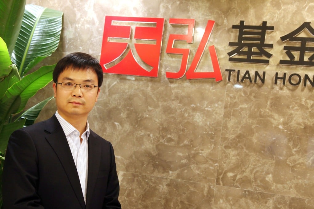 Wang Dengfeng, Yu E Bao Fund Manager at the fixed income department of Tianhong Asset Management, poses for a photo in his office in Beijing. Photo: Keira Lu Huang