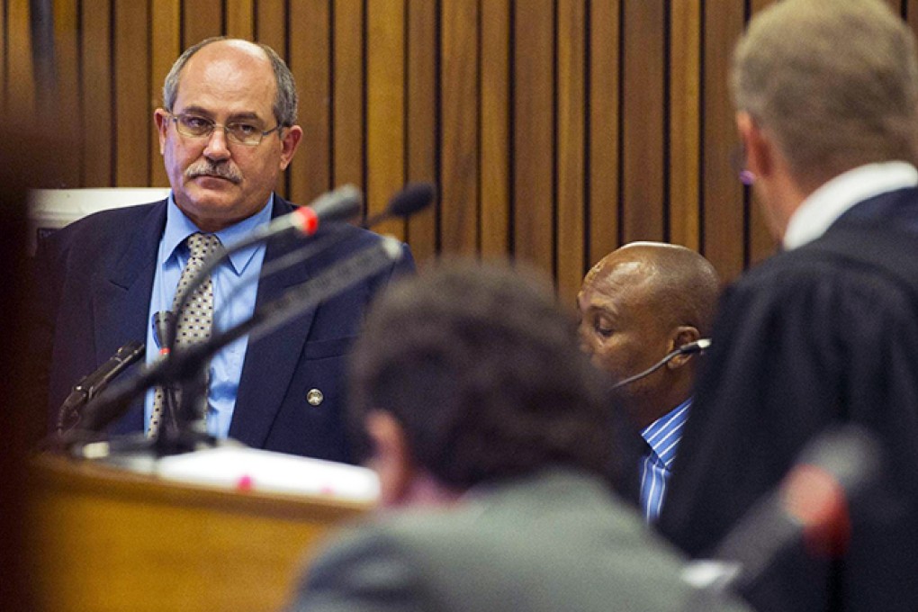 Ex-officer Giliam van Rensburg gives evidence. Photo: AFP