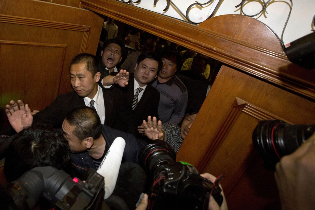 Relatives of the missing flight's Chinese passengers will likely receive payouts soon. Photo: AP