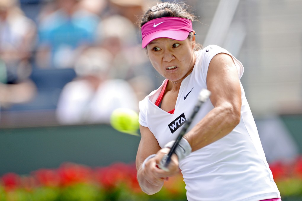 Li Na hits a double-handed backhand against Dominika Cibulkova in her 6-3, 4-6, 6-3 quarter-final victory. Photo: USA Today