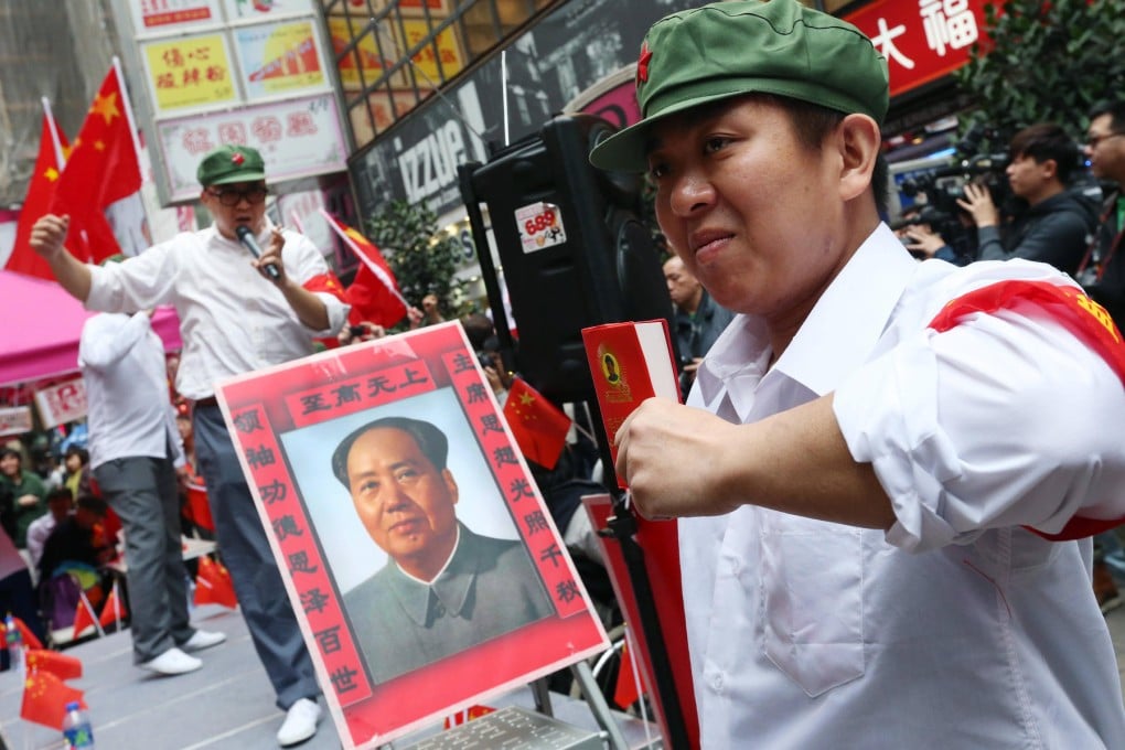 Protesters dressed as Red Guards at the rally. Photo: David Wong