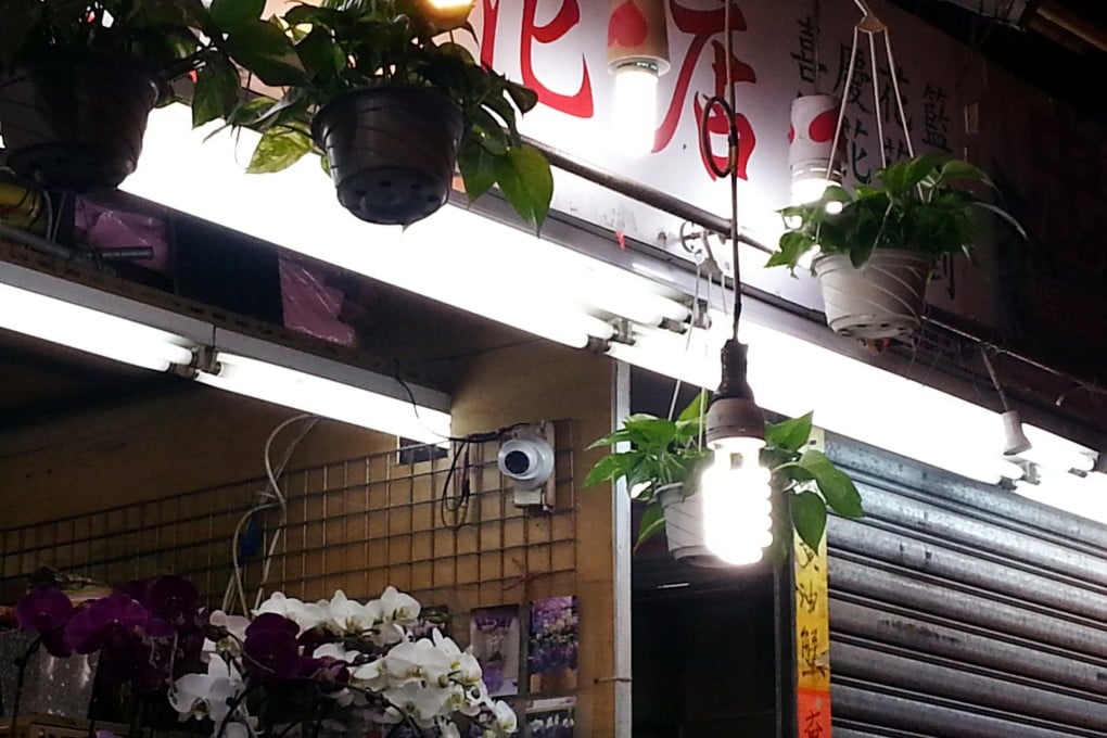 Post reporter Lana Lam, starting her "spot the CCTV camera" journey from the SCMP office in Causeway Bay, walks through wet markets in Wan Chai and the IFC in Central, then gets onto an MTR train and pops into a 7-11 store before arriving at the departure hall in Chek Lap Kok. She spotted at least 100 cameras. Most probably, hundreds more spotted her. Photos: David Wong, Lana Lam