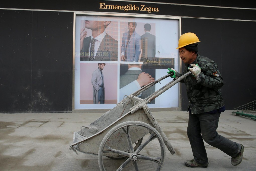 A worker in Qingdao. Photo: EPA