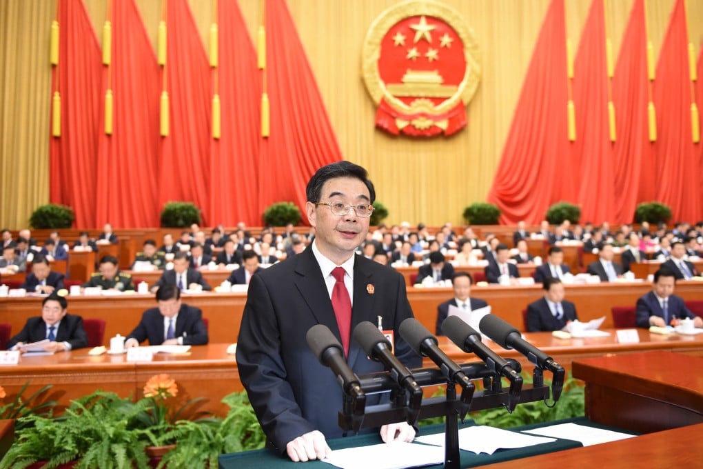 Zhou Qiang, president of China's Supreme People's Court (SPC), delivers a report on the SPC's work at China's 12th National People's Congress in Beijing. Photo: Xinhua
