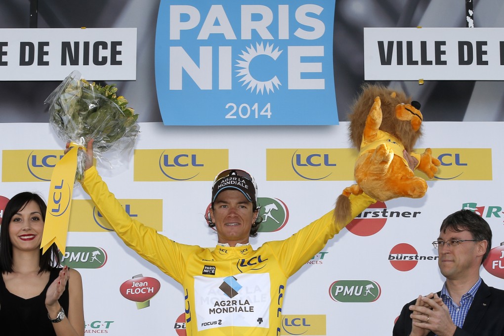 Winner of the Paris-Nice cycling race, Colombia's Carlos Betancur celebrates on the podium after the final stage in Nice. Photo: AP