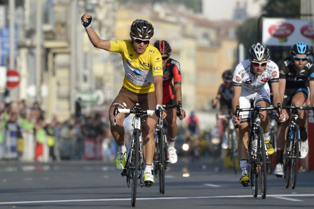 Colombia's Carlos Betancur celebrates as he crosses the finish line in Nice to seal overall victory. Photo: AFP