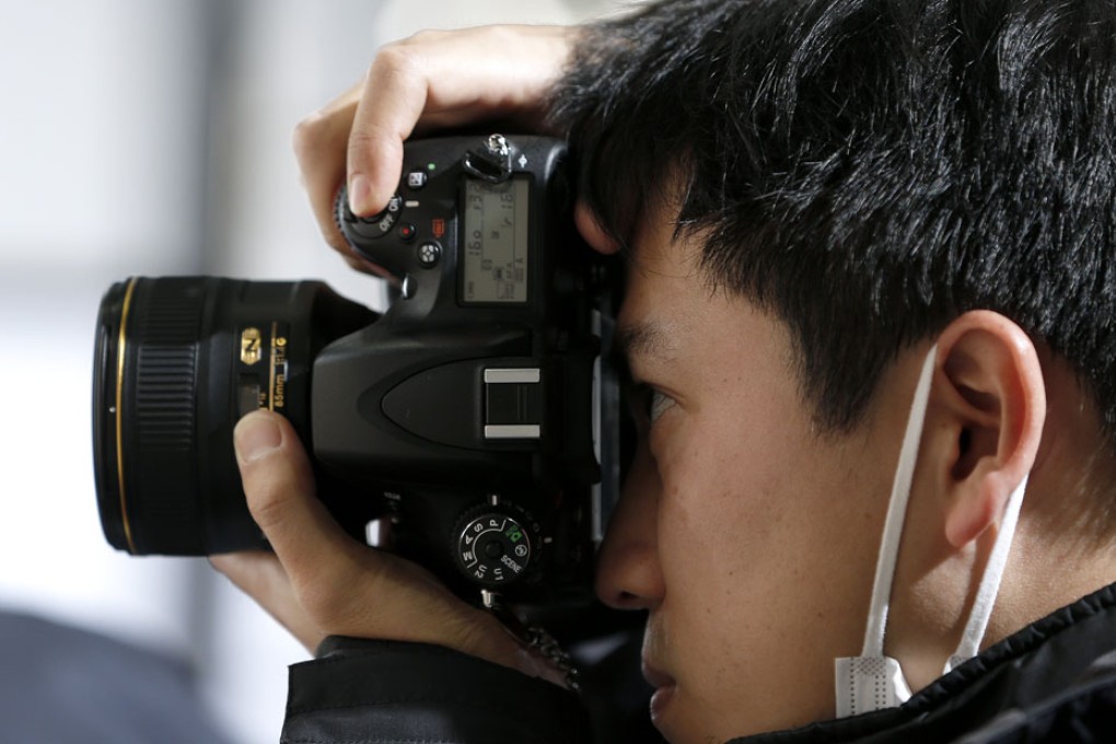 The Nikon D600 camera produced pictures with black spots and customer service did not adequately resolve the issue.