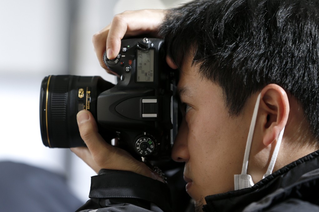 The Nikon D600 camera produced pictures with black spots and customer service did not adequately resolve the issue.