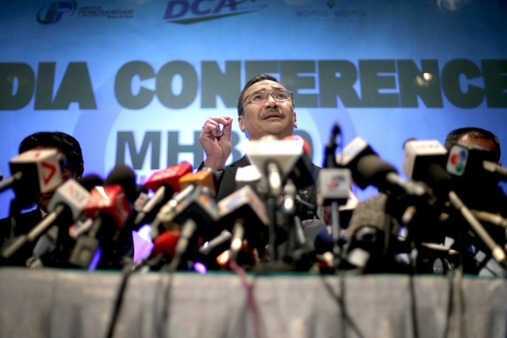 Malaysia's Minister of Transport Hishamuddin Hussein takes questions from the media during a press conference about the missing Malaysia Airlines jetliner MH370. Photo: AP