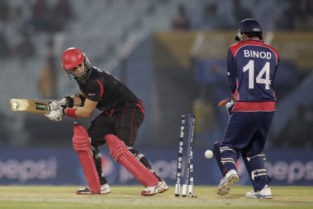 Hong Kong's Mark Chapman is bowled out during their ICC Twenty20 Cricket World Cup opening match against Nepal in Chittagong, Bangladesh. Photo: AP