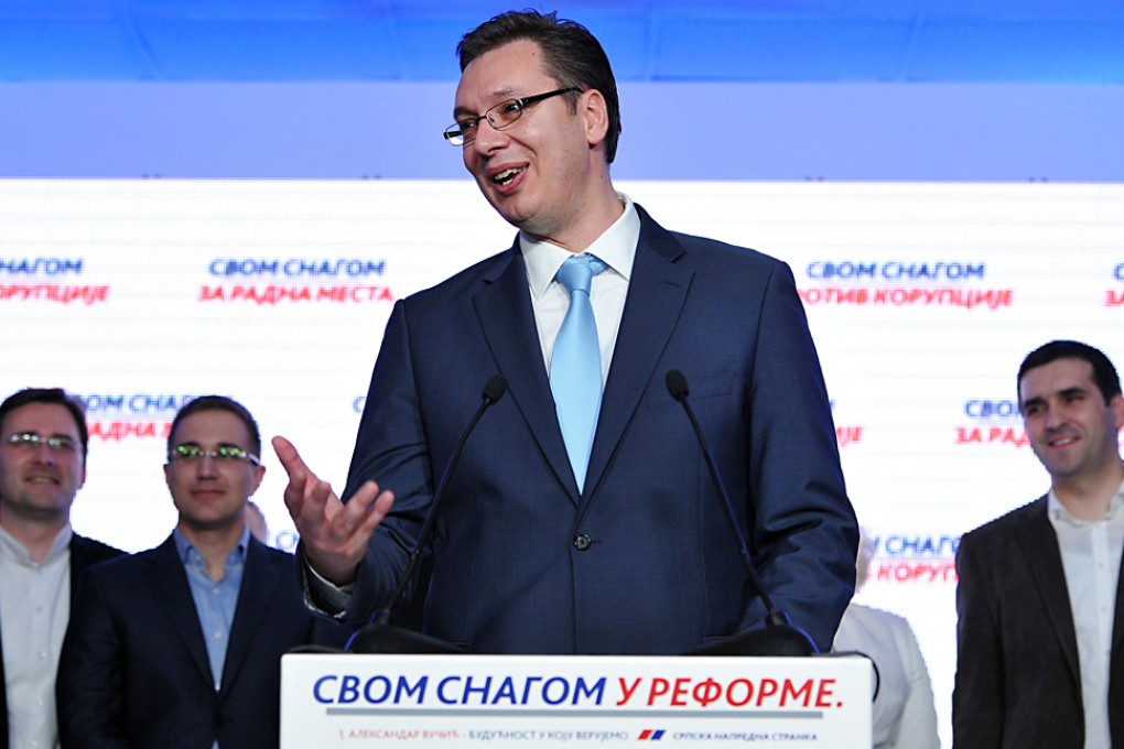 Deputy Prime Minister Aleksandar Vucic and leader of the ruling Serbian Progressive Party (SNS) gestures during a press conference in Belgrade. Photo: AFP