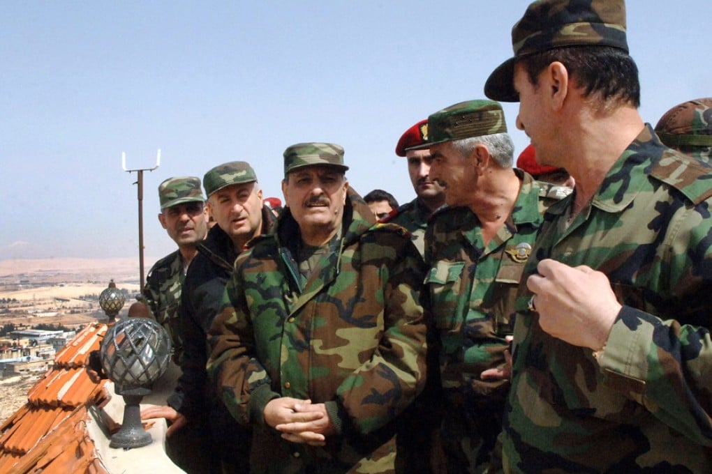 Officials visit the town of Yabroud, Syria. Yabroud was an important supply line for rebels into Lebanon.