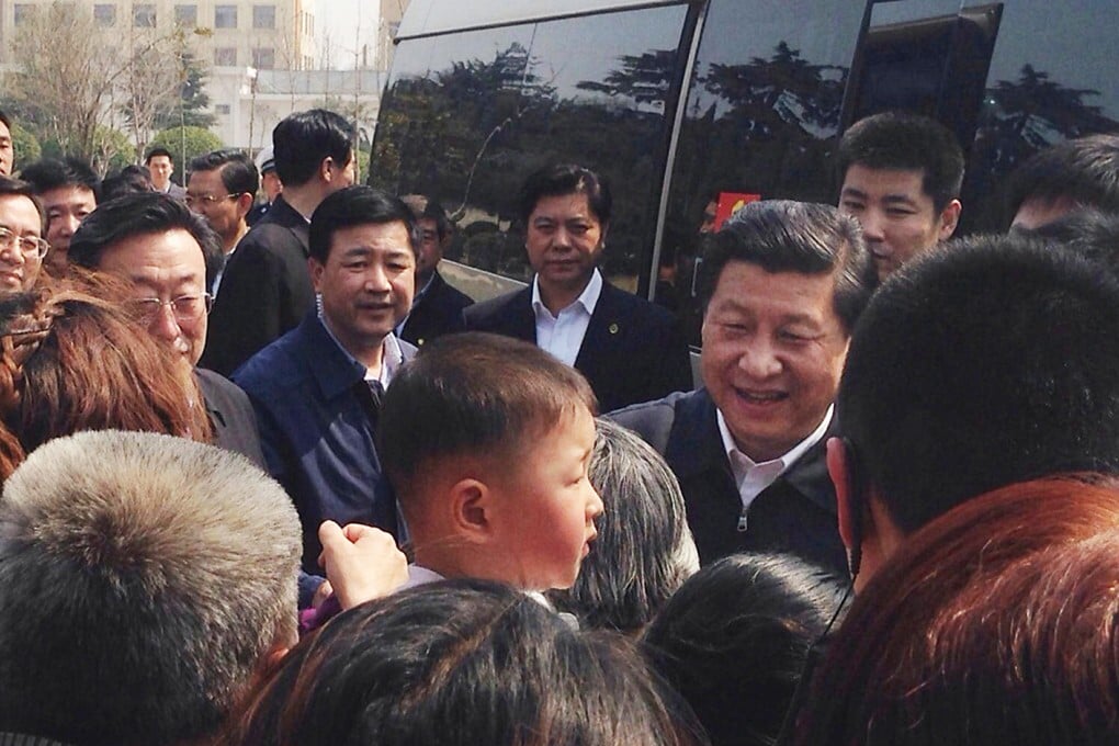 President Xi Jinping drew dozens on onlookers when he made an unannounced visit to Kaifeng yesterday. Photo: SCMP
