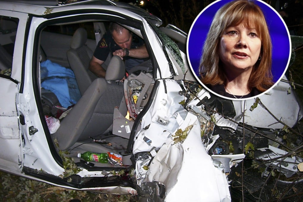 A Wisconsin State Patrol police officer looks through the wreck of a 2005 Chevy Cobalt in St Croix, Wisconsin. CEO Mary Barra (inset) has apologised for deaths linked to the delayed recall. Photos: Reuters, EPA