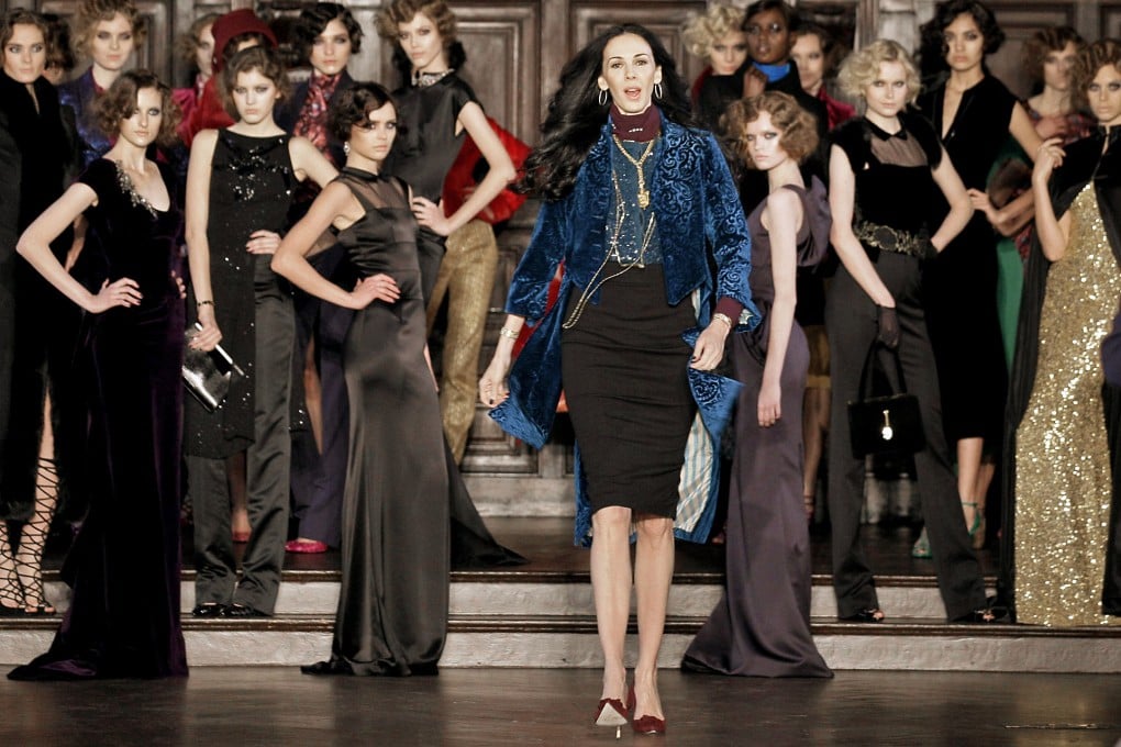 L'Wren Scott walks forward to take the applause during New York Fashion Week in 2012 after exhibiting her autumn collection. Photo: AP