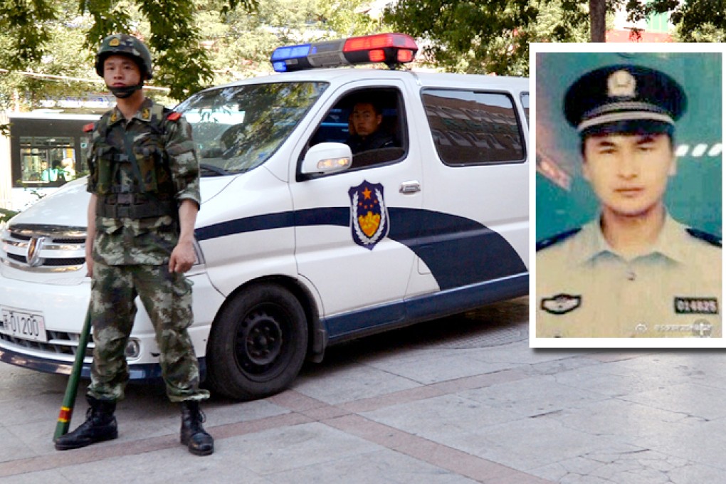 Police standing guard in the Muslim quarter of Urumqi and Osmanjan Ghoji (inset), the policeman who died in the attack on Monday. Photo: AFP