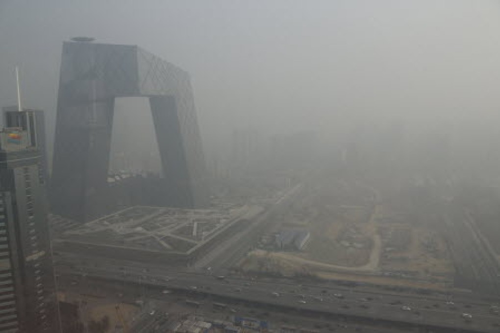 The centre of Beijing shrouded in smog. Technologies will be tested in the capital to try to help tackle the problem. Photo: Reuters