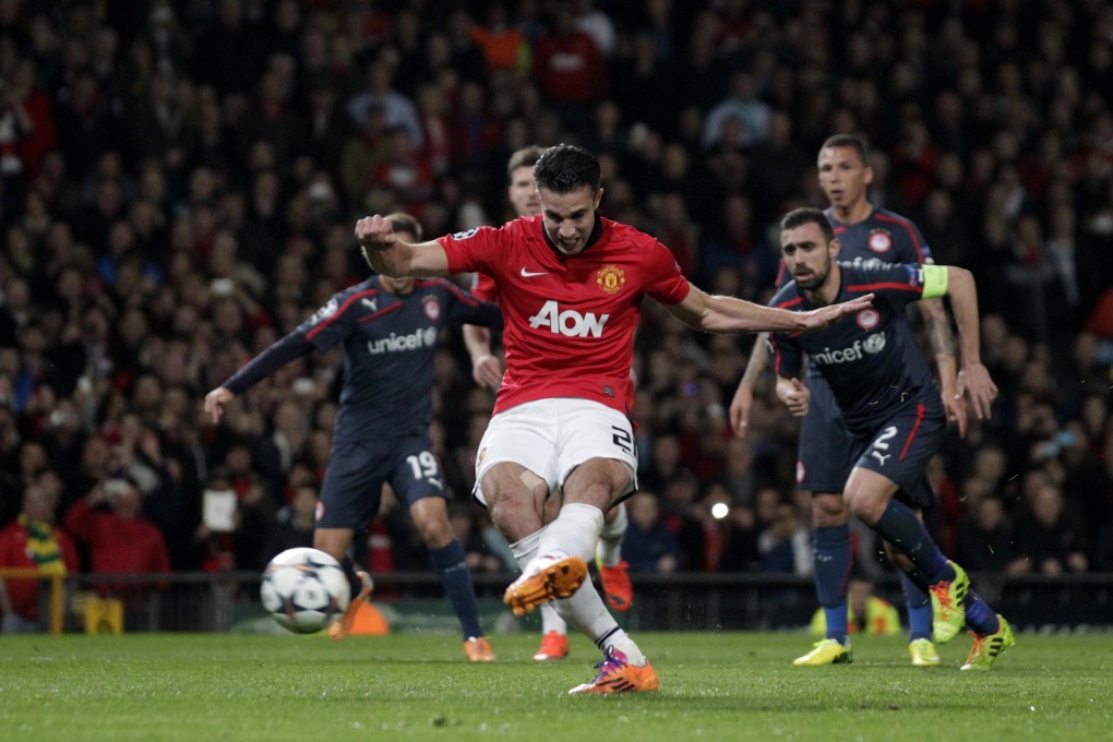 Manchester United's Robin van Persie scores his first goal of the night, from the penalty spot. Photo: AP