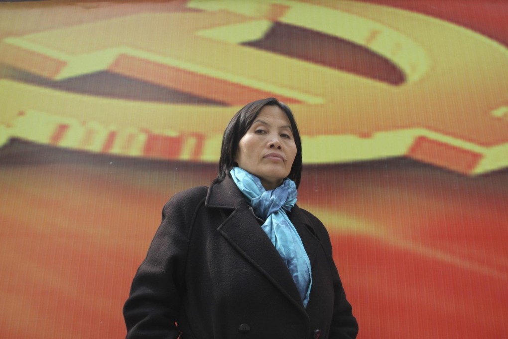 Cao Shunli, shown here last March, was detained while trying to board a plane for Geneva. Photo: Reuters