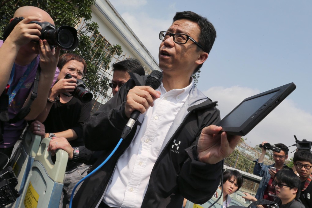 HKTV chairman Ricky Wong with the portable television on which he managed to pick up transmissions from ATV and TVB. Photo: K.Y. Cheng